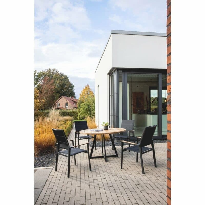 Niehoff "Milan" Gartentisch Ø 125 cm, Gestell Stahl anthrazit, Tischplatte Teakholz geölt und Stuhl "Revent"