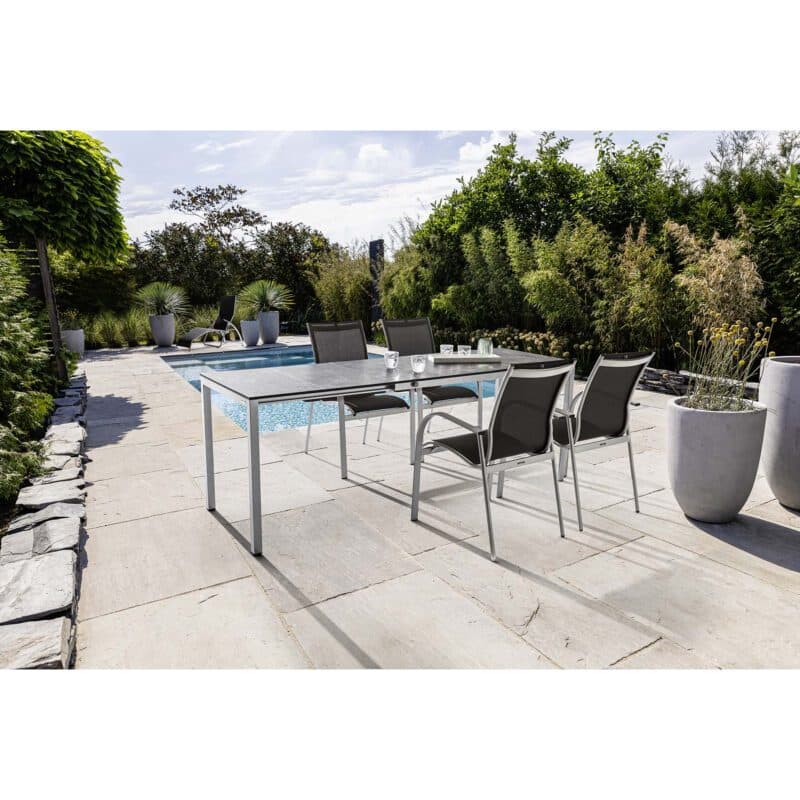 Kettler Gartenmöbel-Set mit Stapelstuhl "Tampa" Textilgewebe anthrazit und Ausziehtisch "Cubic" 140/175/210x70 cm, Alu silber, Tischplatte HPL